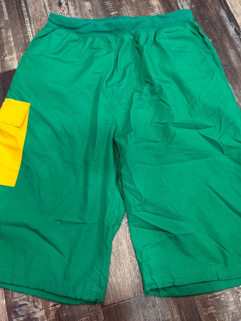 Men's Green Flat Front Shorts with Yellow Pocket